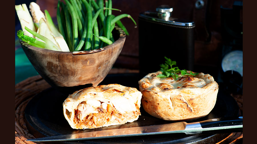 Duet of Rabbit Pie, with fennel mash spring onions and rich orange jus